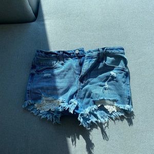 Ripped jean short